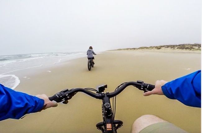 Biking in beach as the featured image for Model R Step-Through Cruiser Post.