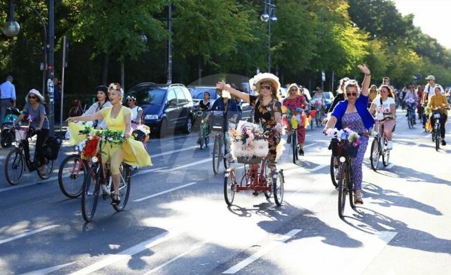 Women Biking in City as the featured image for Level Step-Through E-Bike Post.