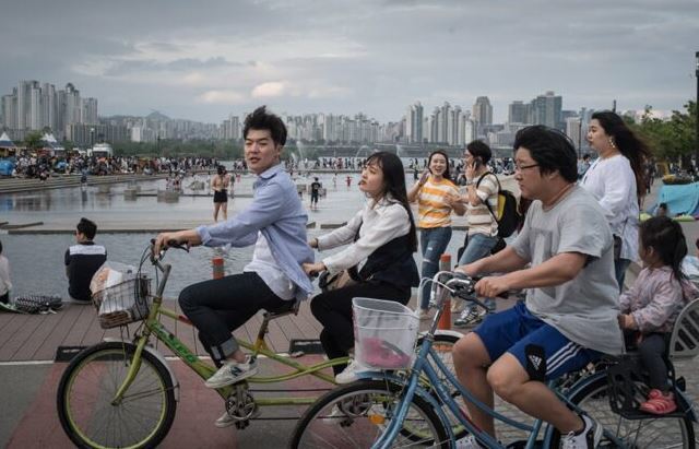 Biking in Seoul as the featured image for RIZE Blade - the best affordable class 3 electric bike post.