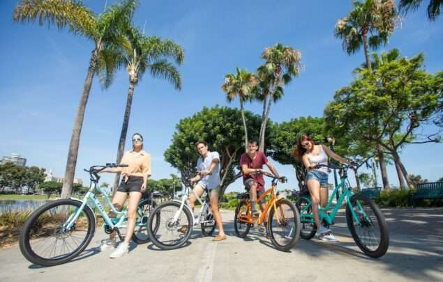 E-LUX E-Bike Riding as the featured image for MALIBU Step-Thru GT - The Best Affordable Luxury E-Bike post.
