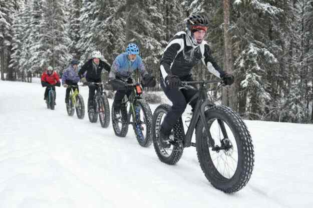 Fat tire snow riding with cruiser step-thru e-bike is secure and fine.