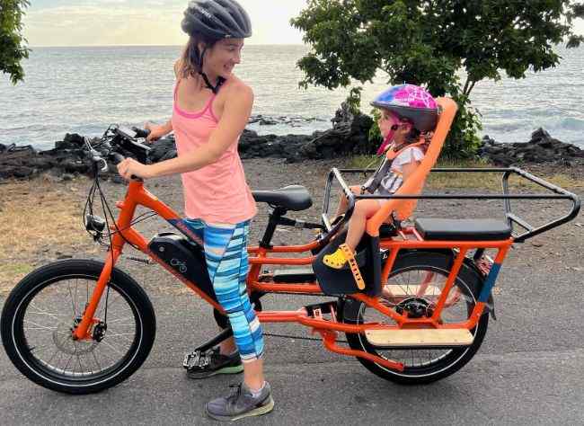 RadWagon 4 Long Tail Cargo E-bike - It features a large cargo platform that can accommodate 2-3 children and up to 400 pounds of cargo.